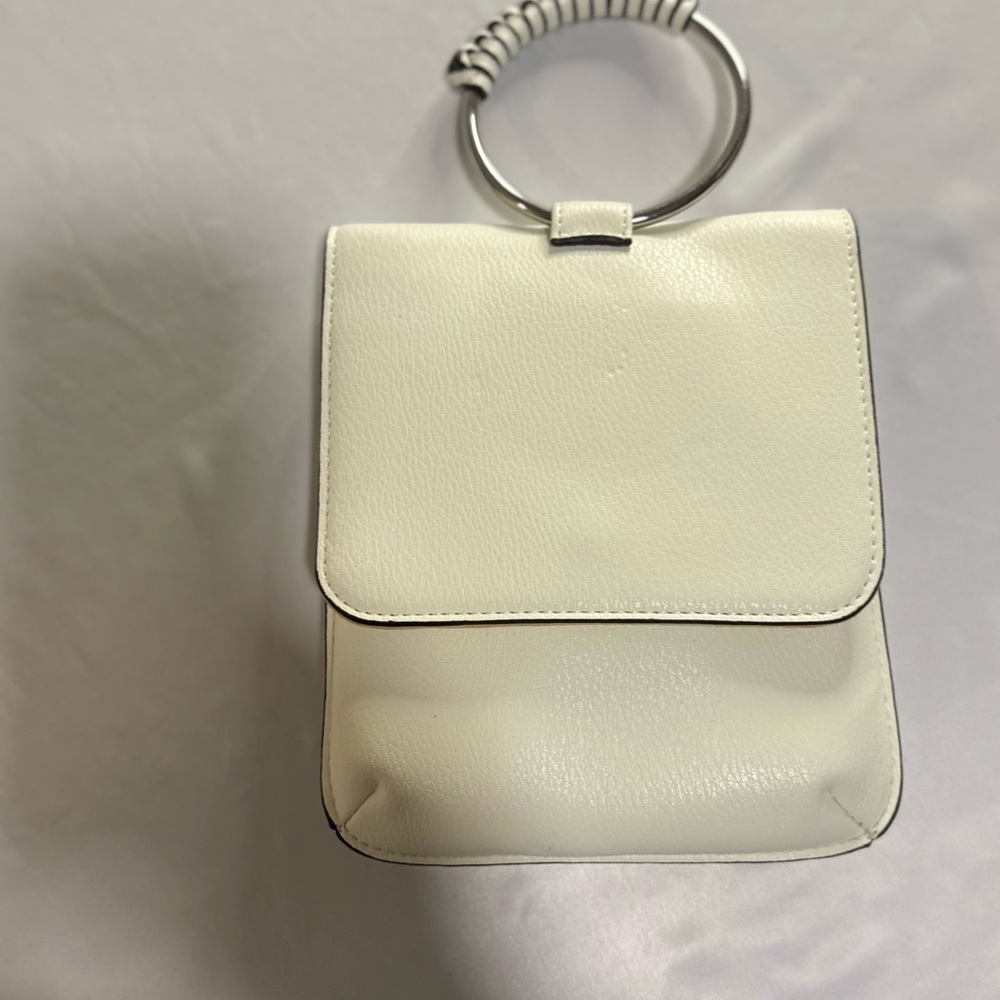 Chic White Handbag with Silver Handle
